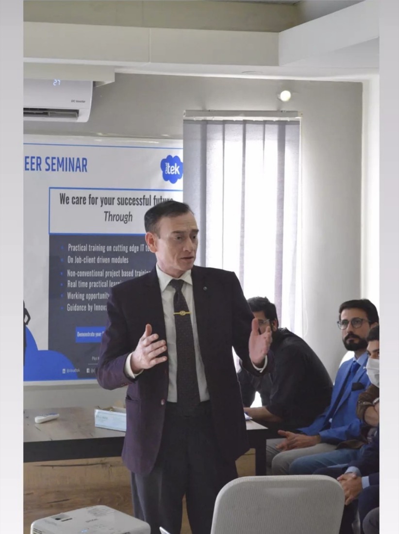 A Cloudtek technology seminar with a speaker and participants